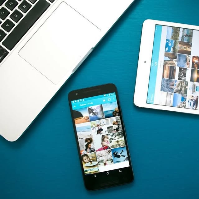 Phone, tablet and laptop showing the same library
